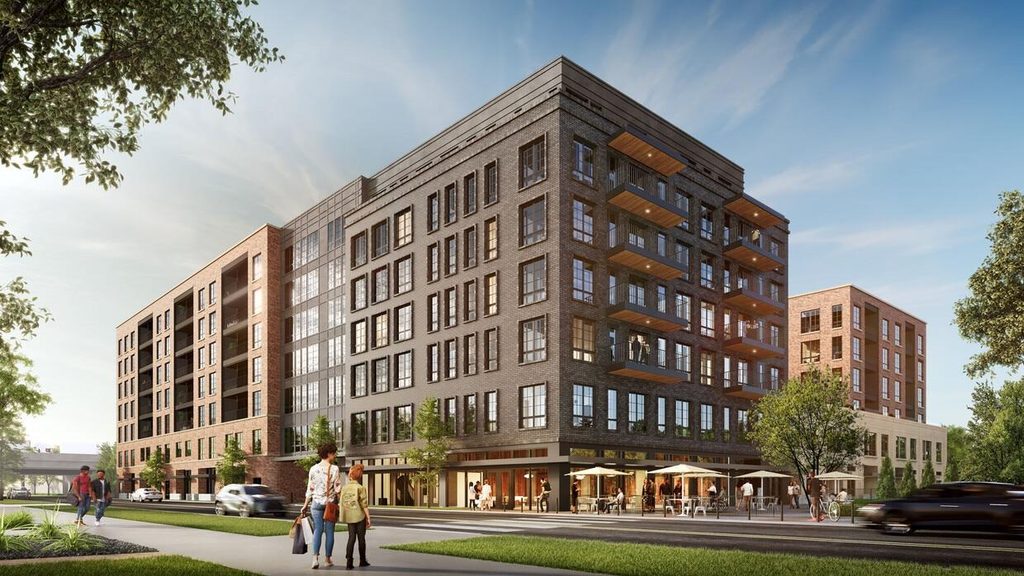 Photorealistic exterior rendering of a modern multifamily apartment building