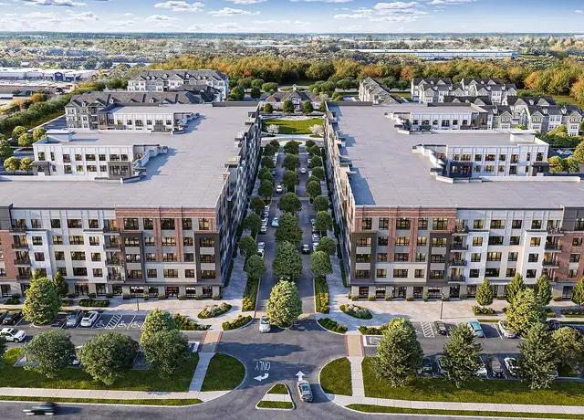 Aerial 3D rendering of a multifamily residential development with landscaped courtyards